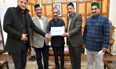 Chairman State co-operative Bank presents CTB to CM