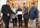 Chairman State co-operative Bank presents CTB to CM